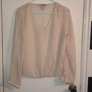 Chiffon v-neck blouse with beaded cuffs